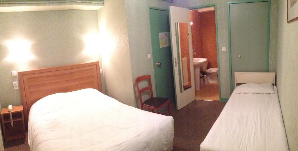 Hotel De L'Abbaye Sauxillanges Quarto foto